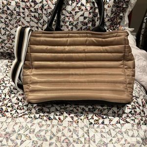 Think Rolyn Bag with crossbody strap or tote strap. Used once. Beautiful bag